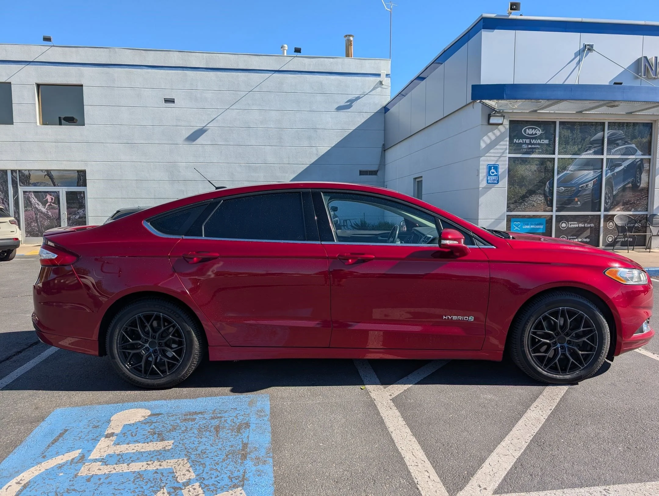 Used 2014 Ford Fusion SE Hybrid with VIN 3FA6P0LU7ER391696 for sale in Salt Lake City, UT