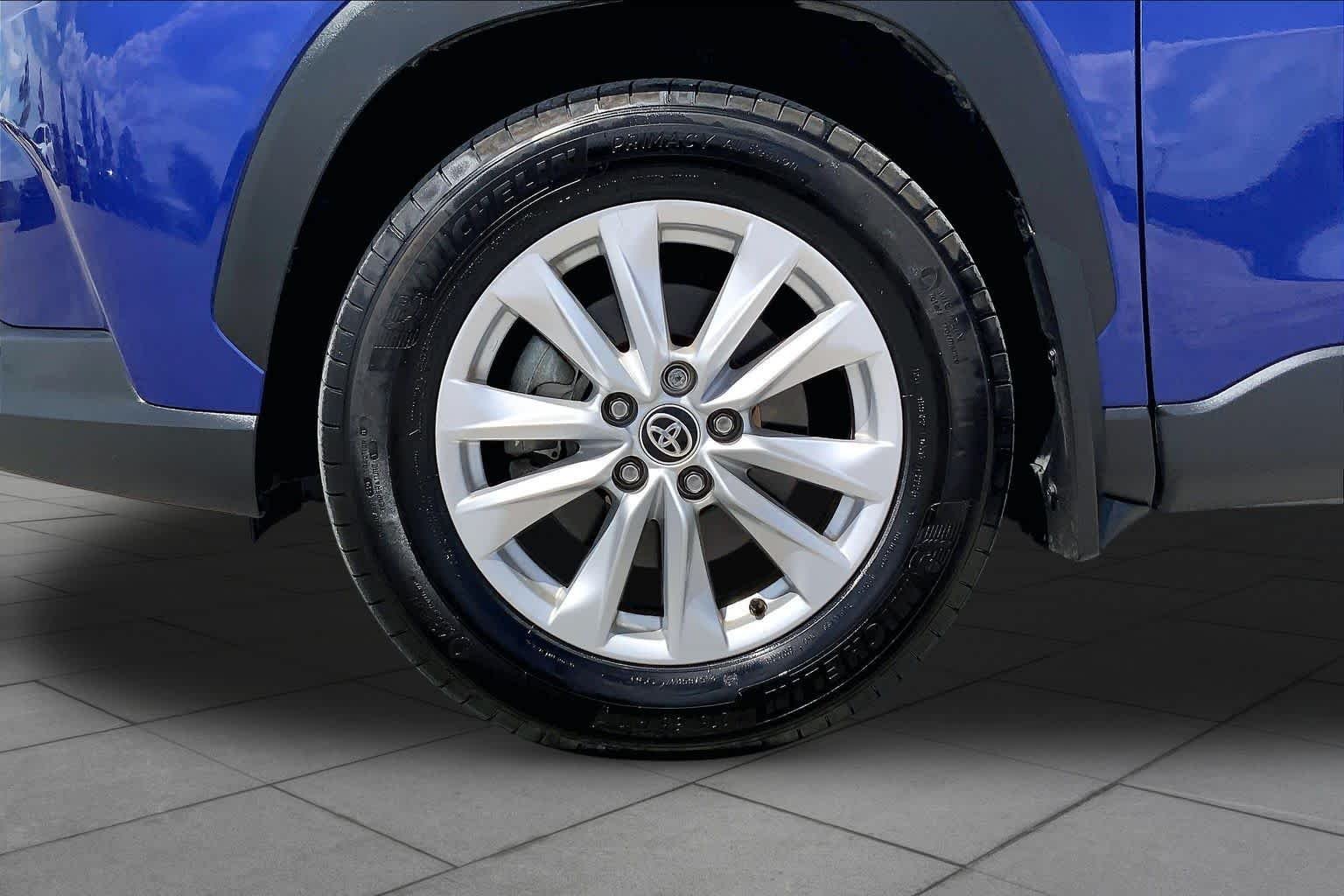 Certified Used 2024 Blue Crush Metallic Toyota LE image 11