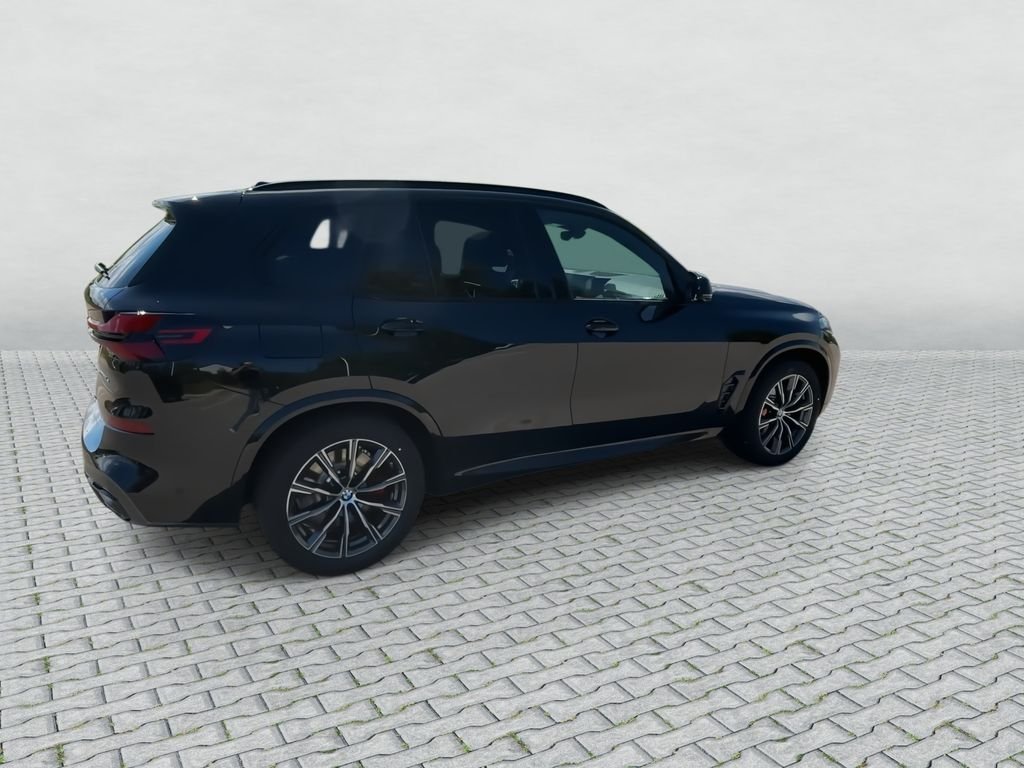 New 2026 Black Sapphire Metallic BMW xDrive50e image 9