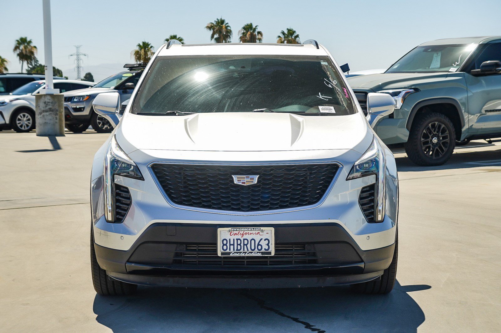 Used 2019 Radiant Silver Metallic Cadillac FWD Sport image 2