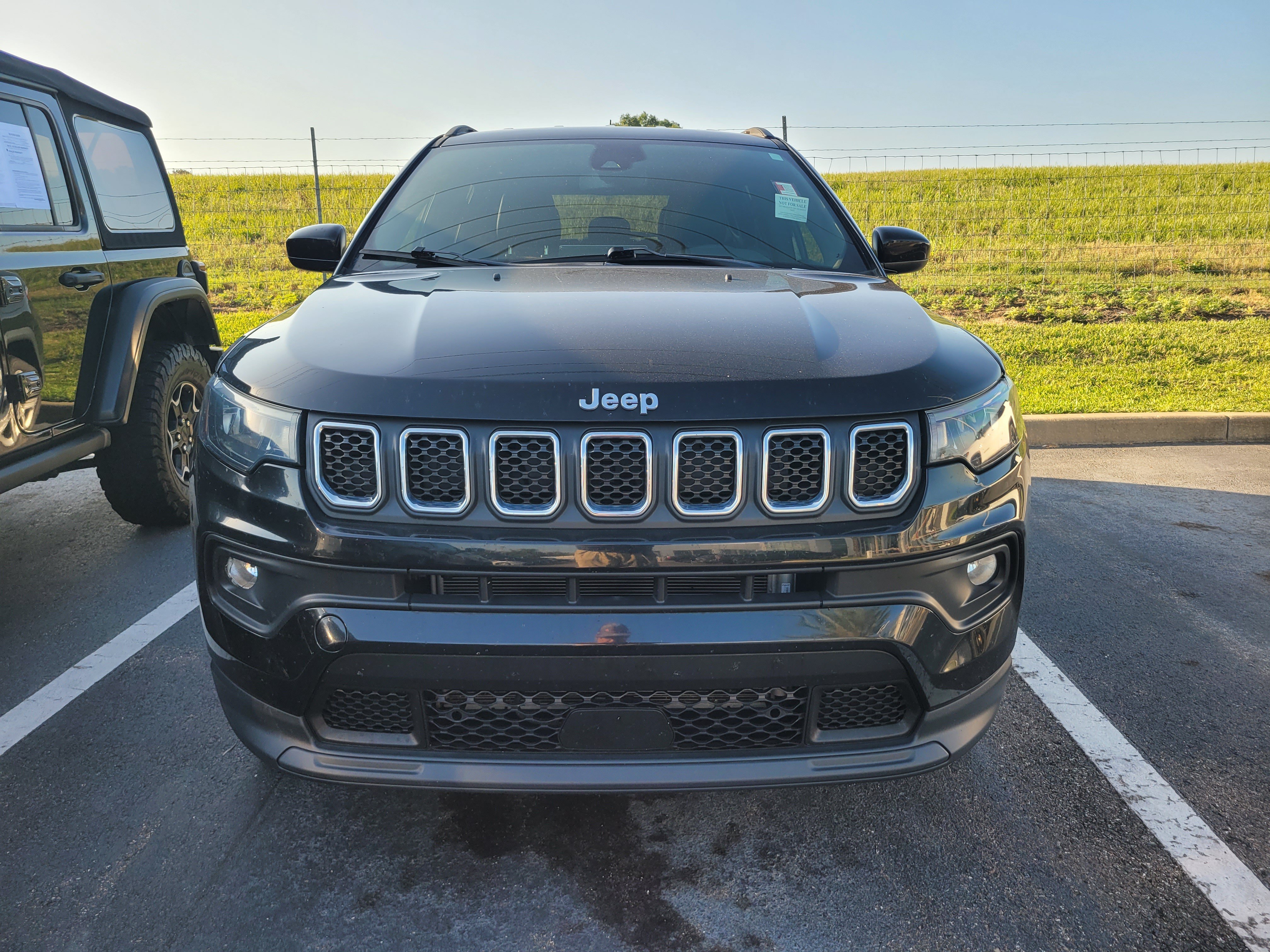 Used 2023 Diamond Black Crystal Pearlcoat Jeep Latitude image 2