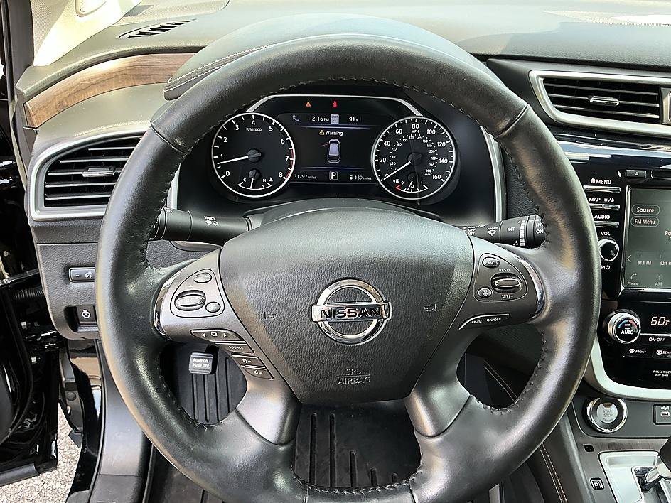 Used 2022 Magnetic Black Pearl Nissan Platinum image 16