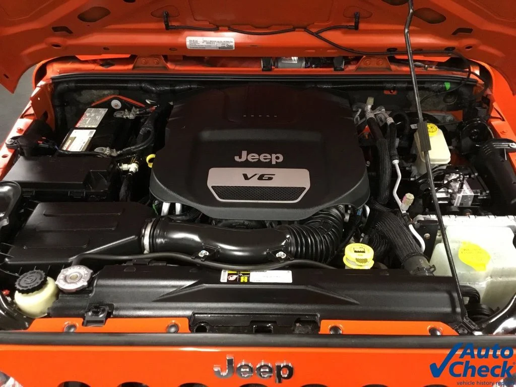 Used 2015 Orange Jeep Unlimited Sport image 44