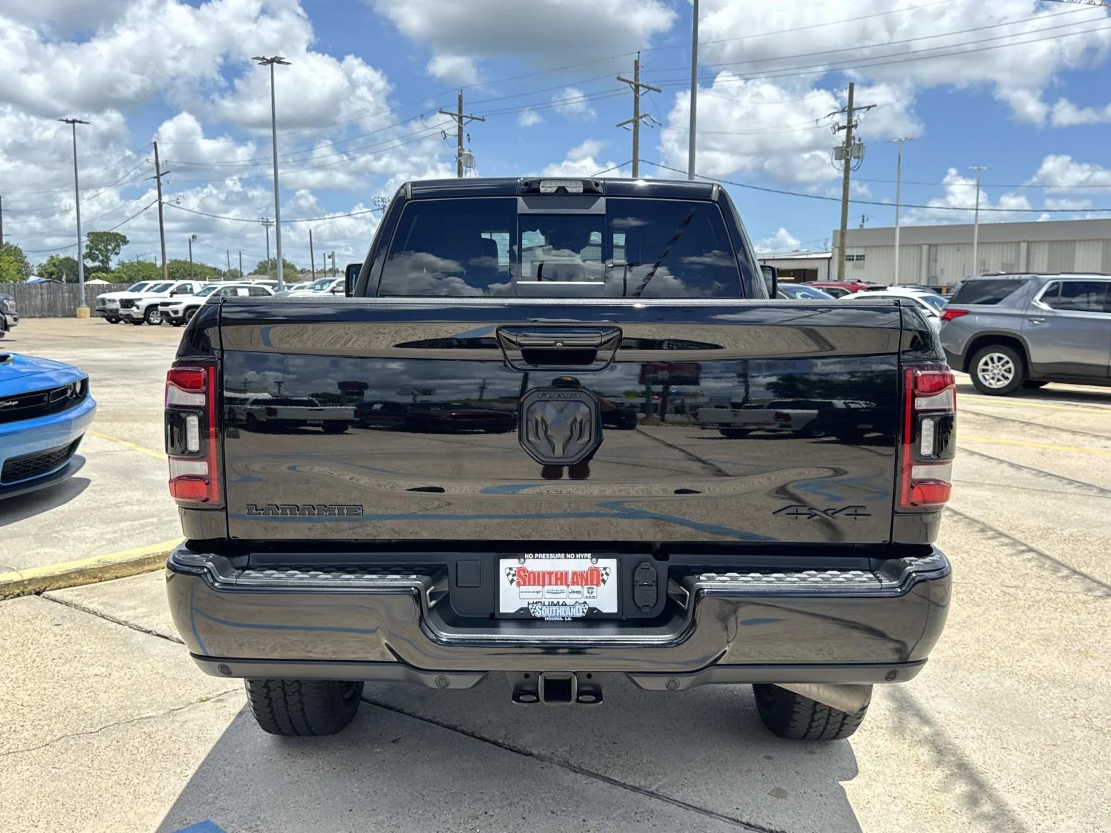 Used 2024 Diamond Black Crystal Pearlcoat Ram Laramie image 6