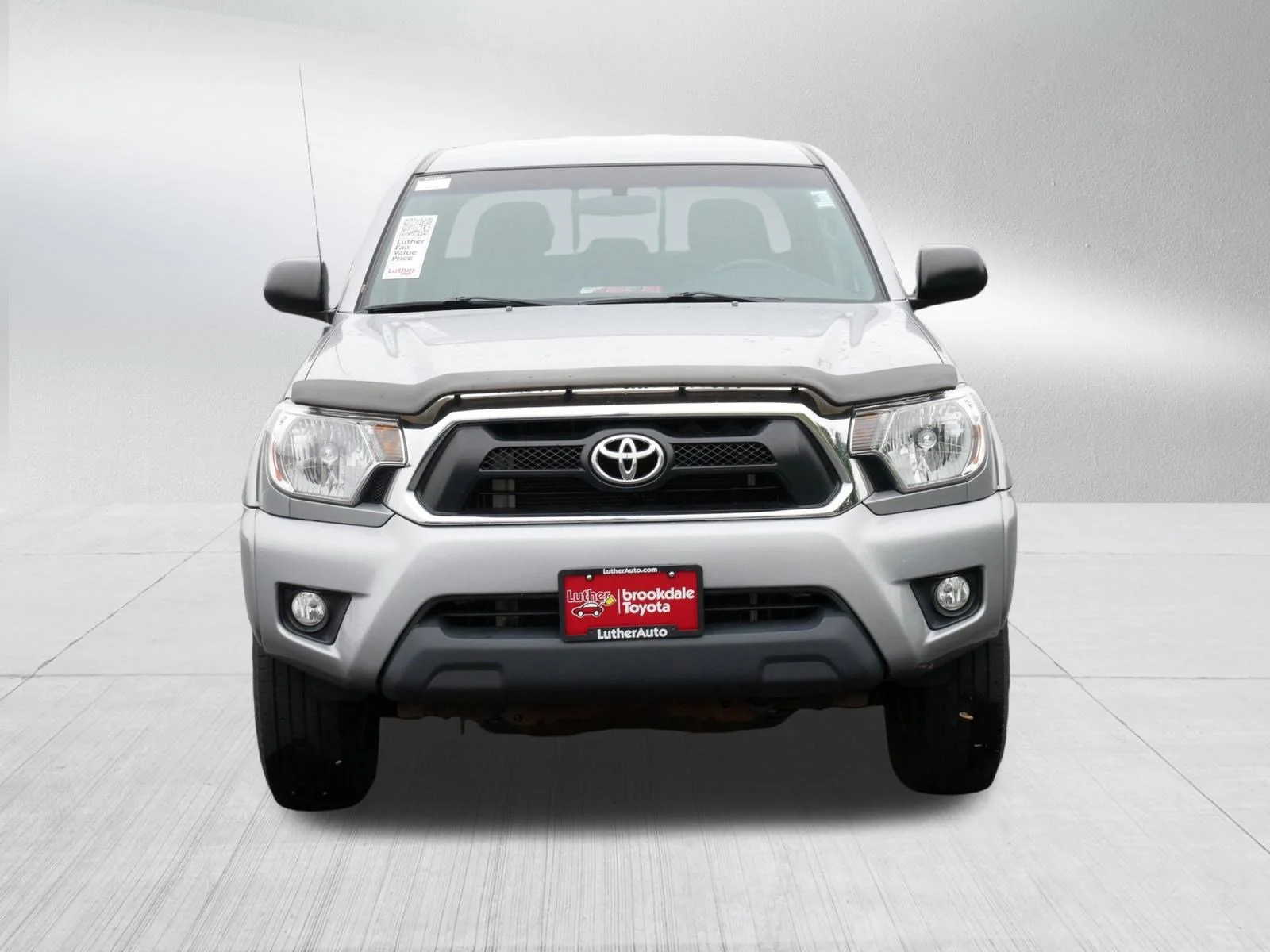 Used 2014 Toyota Tacoma Base with VIN 5TFMU4FN2EX024394 for sale in Brooklyn Center, Minnesota