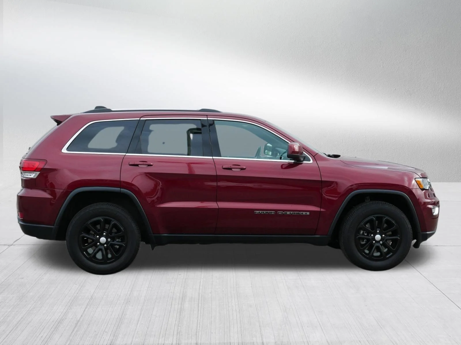 Used 2021 Velvet Red Pearlcoat Jeep Laredo E image 8