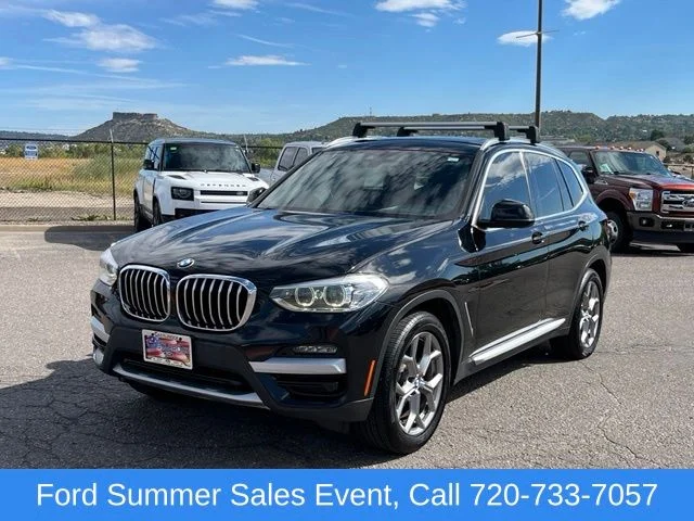 Used 2020 Black BMW xDrive30i image 1