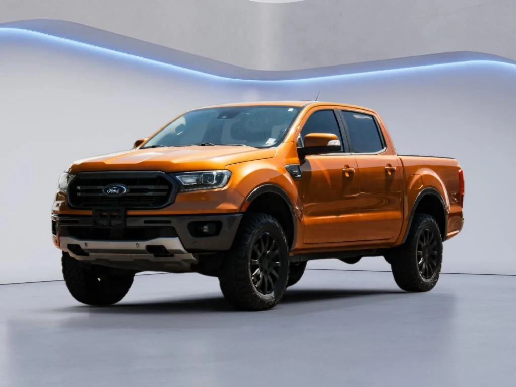 Used 2019 Orange Ford LARIAT image 1