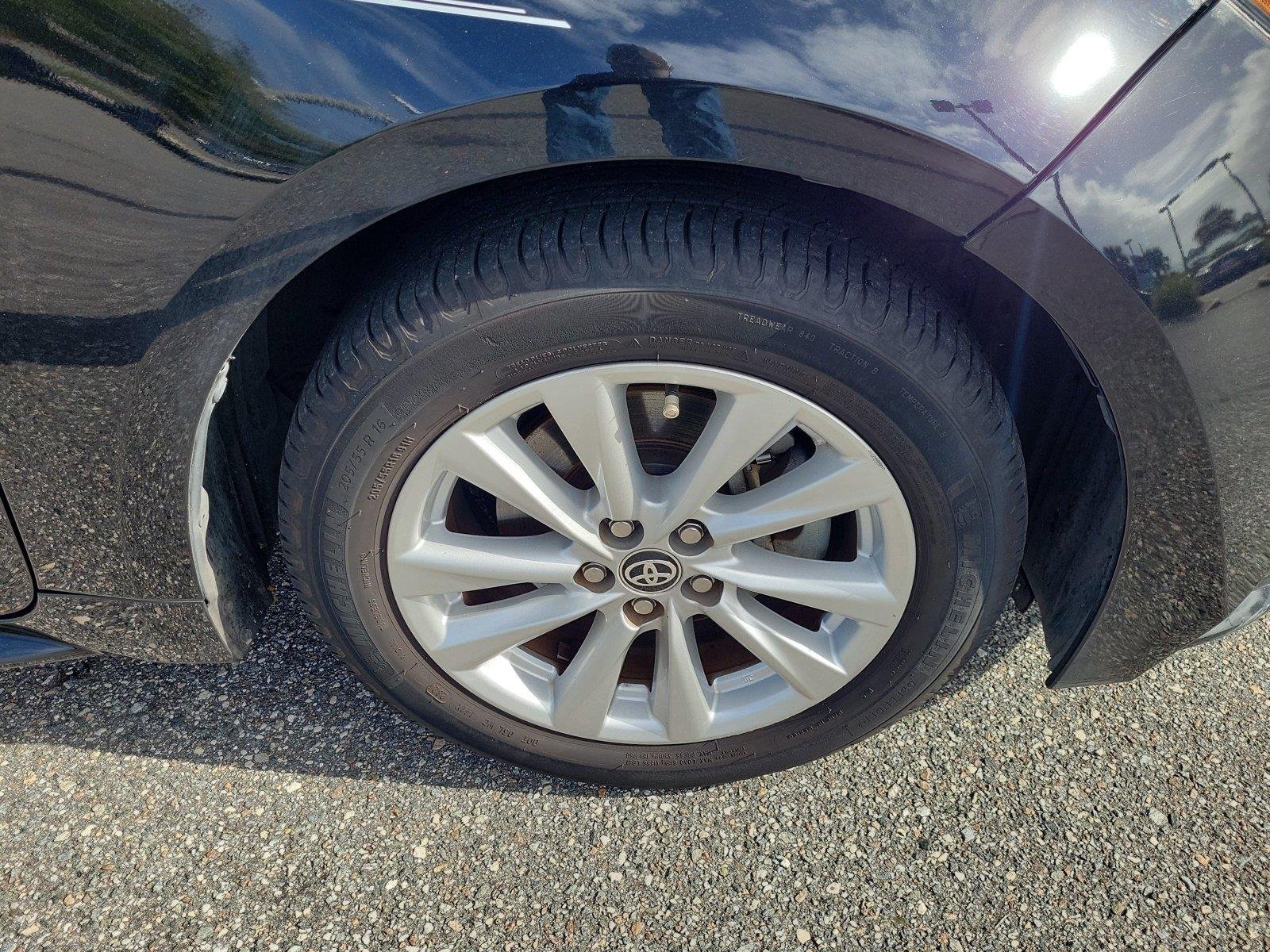 Used 2024 Midnight Black Metallic TOYOTA LE image 6
