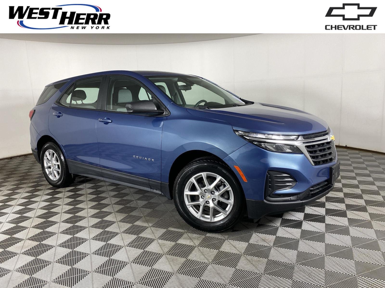 Used 2024 Lakeshore Blue Metallic Chevrolet LS image 1