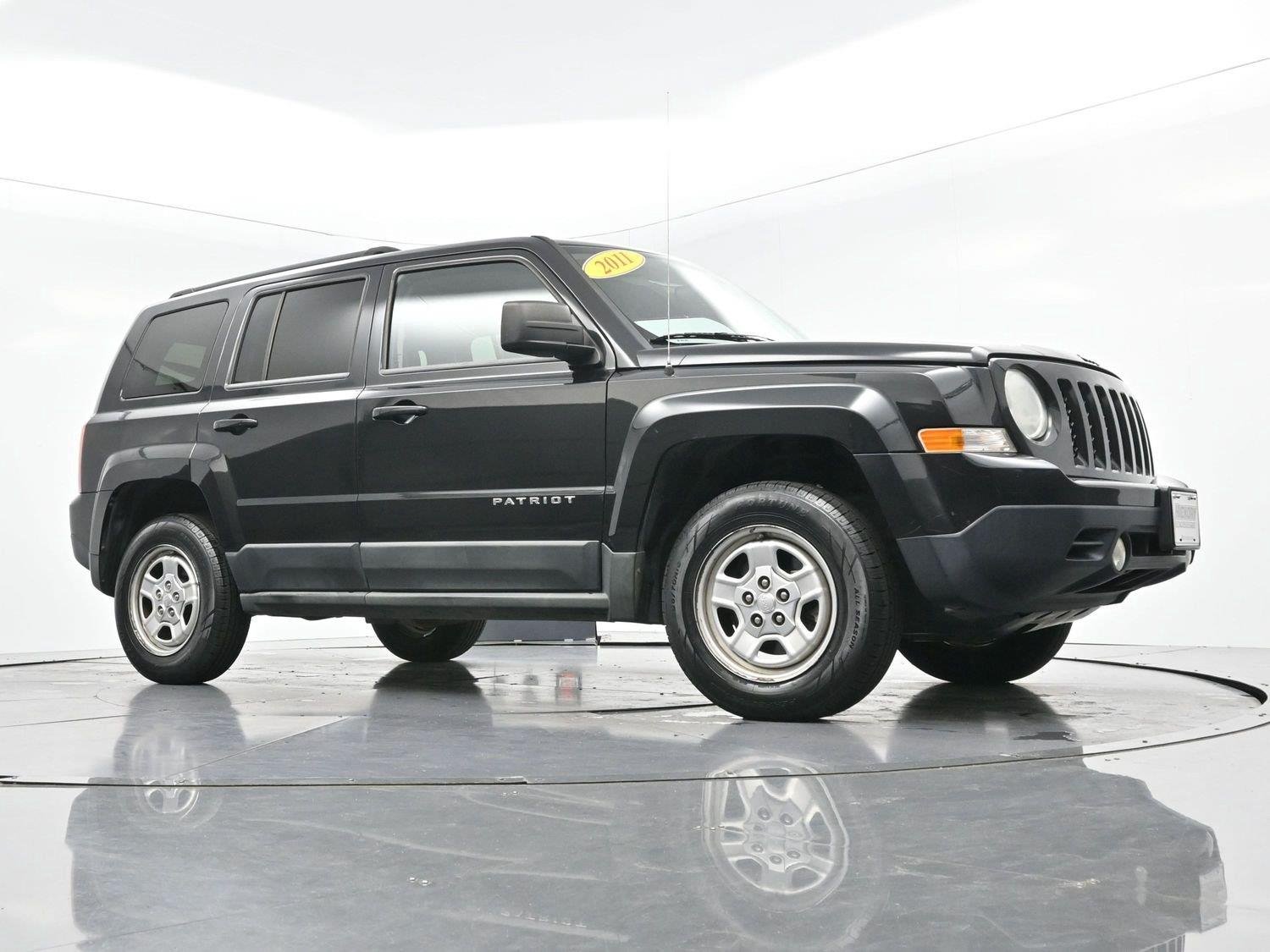 Used 2011 Brilliant Black Crystal Pearl Jeep Sport image 34
