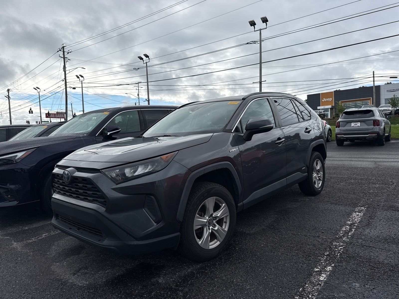 Used 2019 Magnetic Gray Metallic Toyota LE image 1