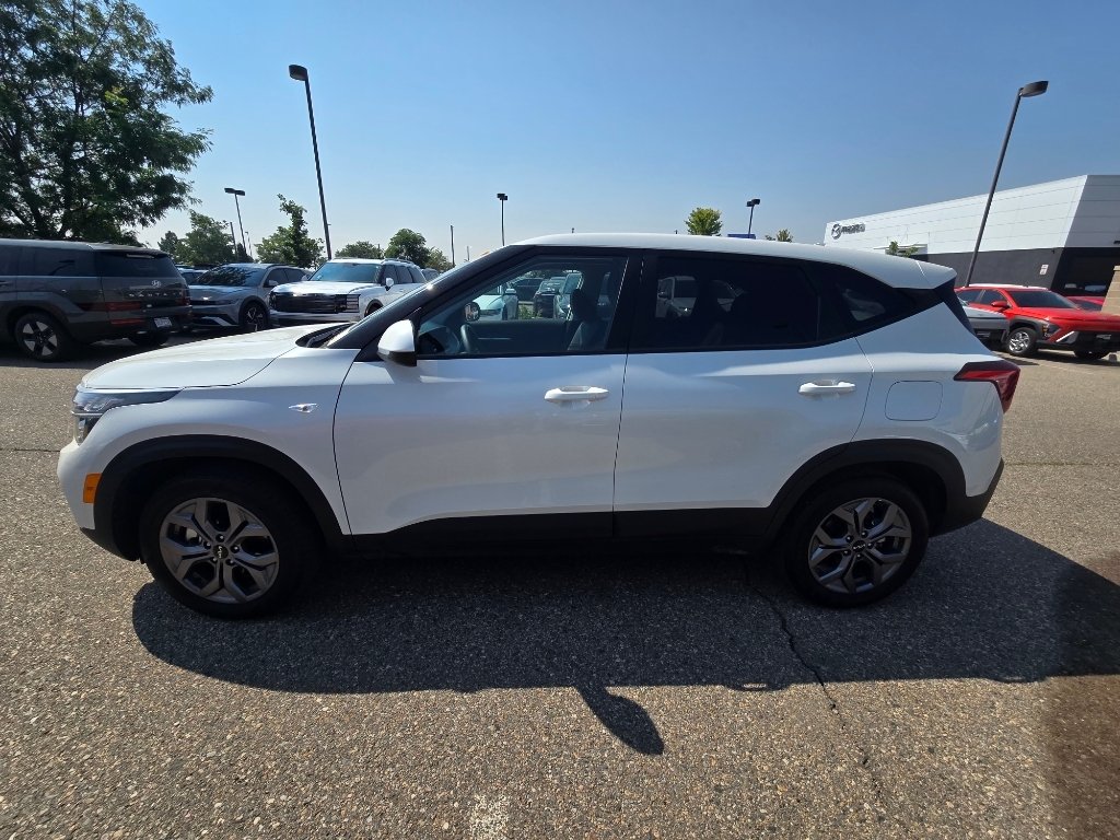 Used 2026 Snow White Pearl Kia LX image 2