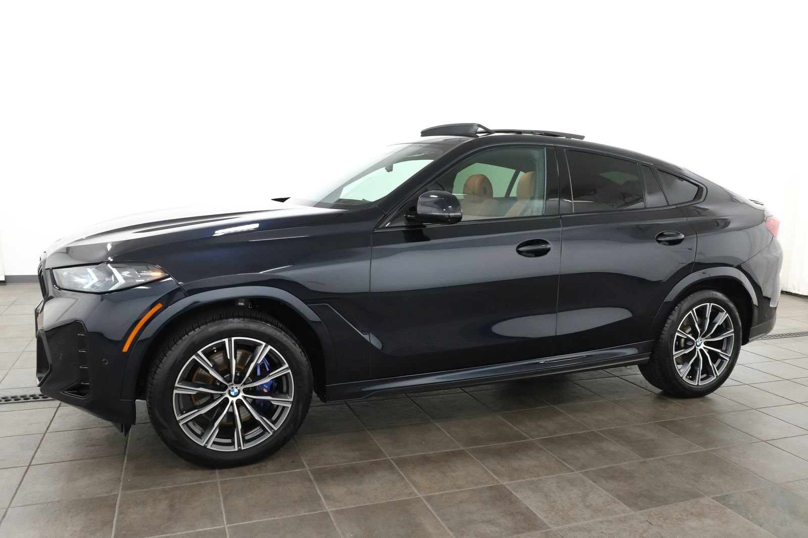 Certified Used 2024 Carbon Black Metallic BMW xDrive40i image 2