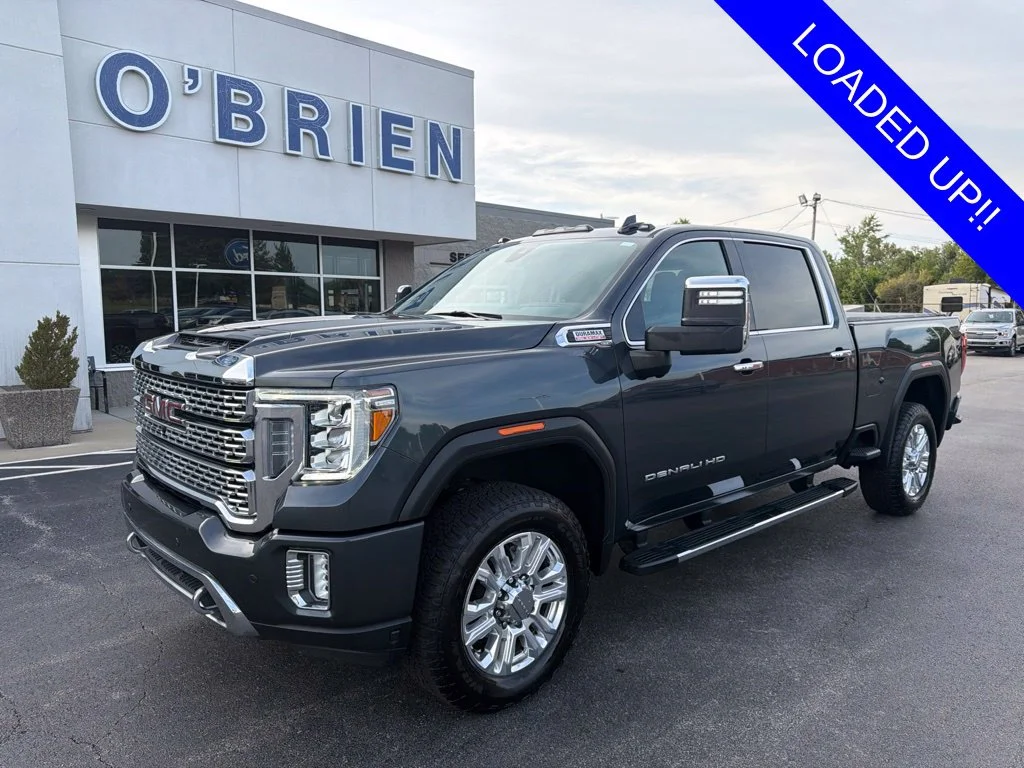 Used 2021 Hunter Green GMC Denali image 1