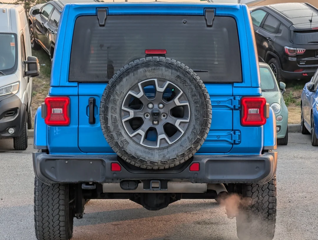 Used 2024 Blue Jeep Sahara - - 4x4 - Leather Seats - Power Soft Top - Remote Start & More! image 7