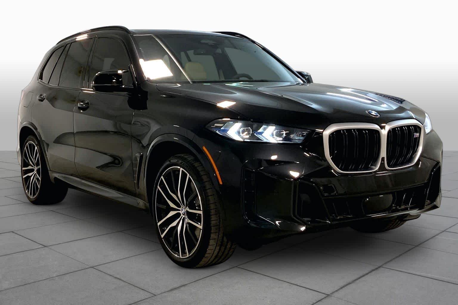 New 2026 Black Sapphire Metallic BMW M60i image 2