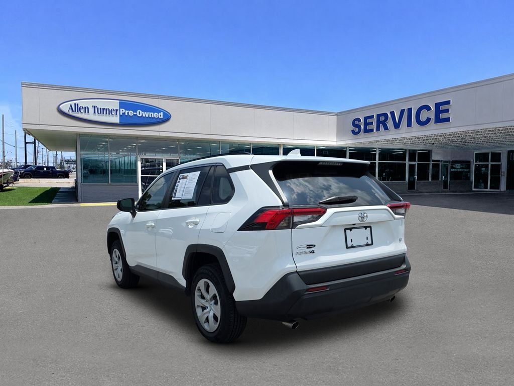 Used 2021 Super White Toyota LE image 6