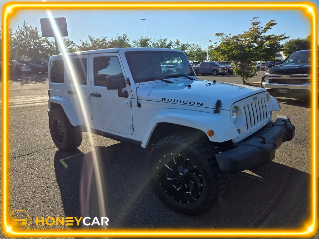 Used 2015 White Jeep Unlimited Rubicon image 1