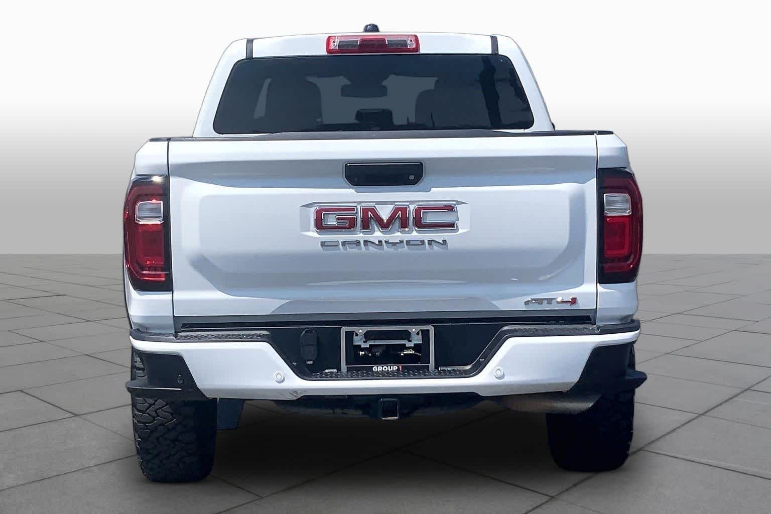 Used 2024 Summit White GMC 4WD AT4 image 10