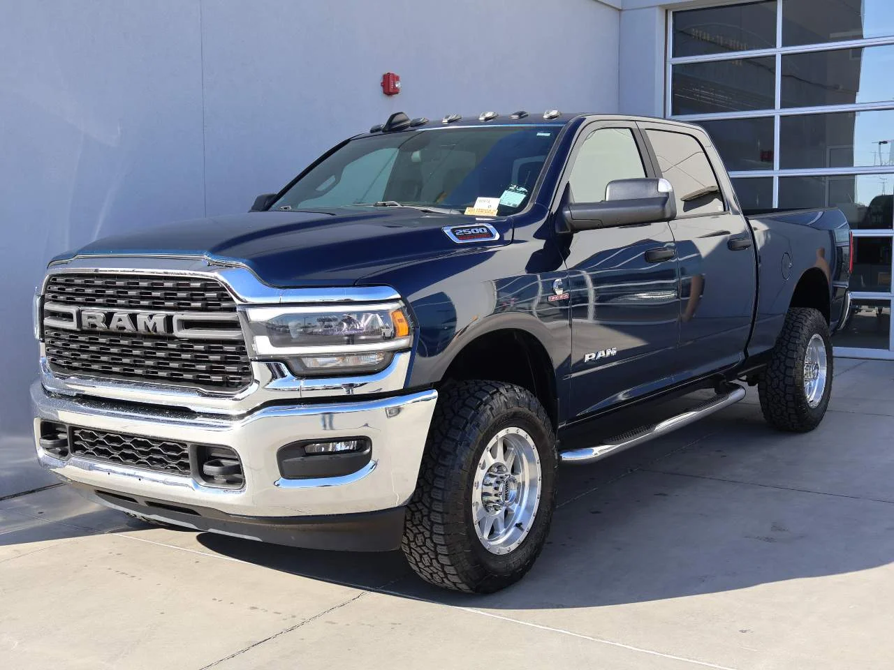 Used 2022 Patriot Blue Pearl Coat Ram Big Horn Crew Cab image 1