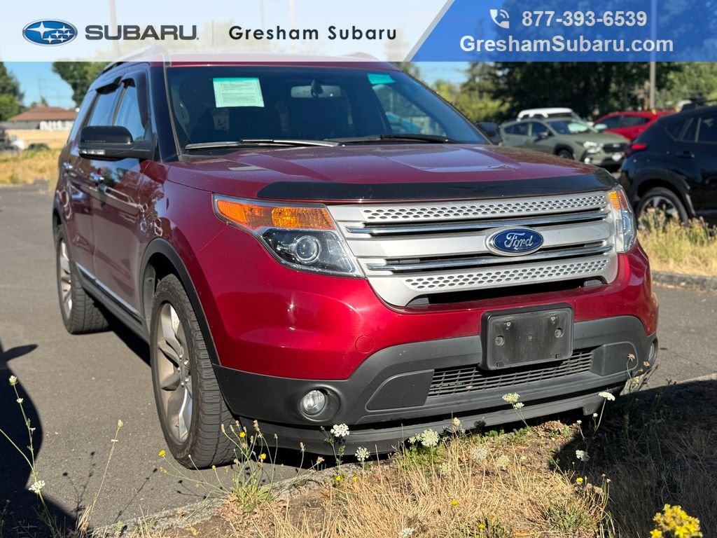 Used 2014 Ruby Red Metallic Ford XLT image 1