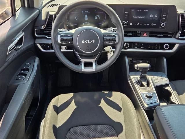 Used 2025 Snow White Pearl Kia LX image 12