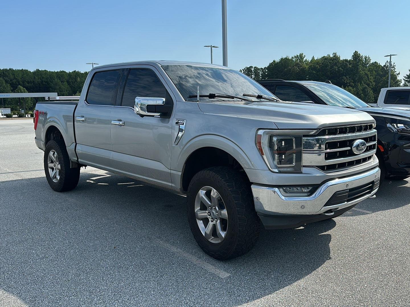 Used 2021 Iconic Silver Metallic Ford LARIAT image 1