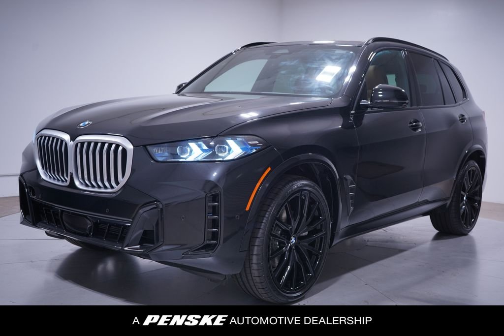 Used 2026 Black Sapphire Metallic BMW xDrive40i image 1