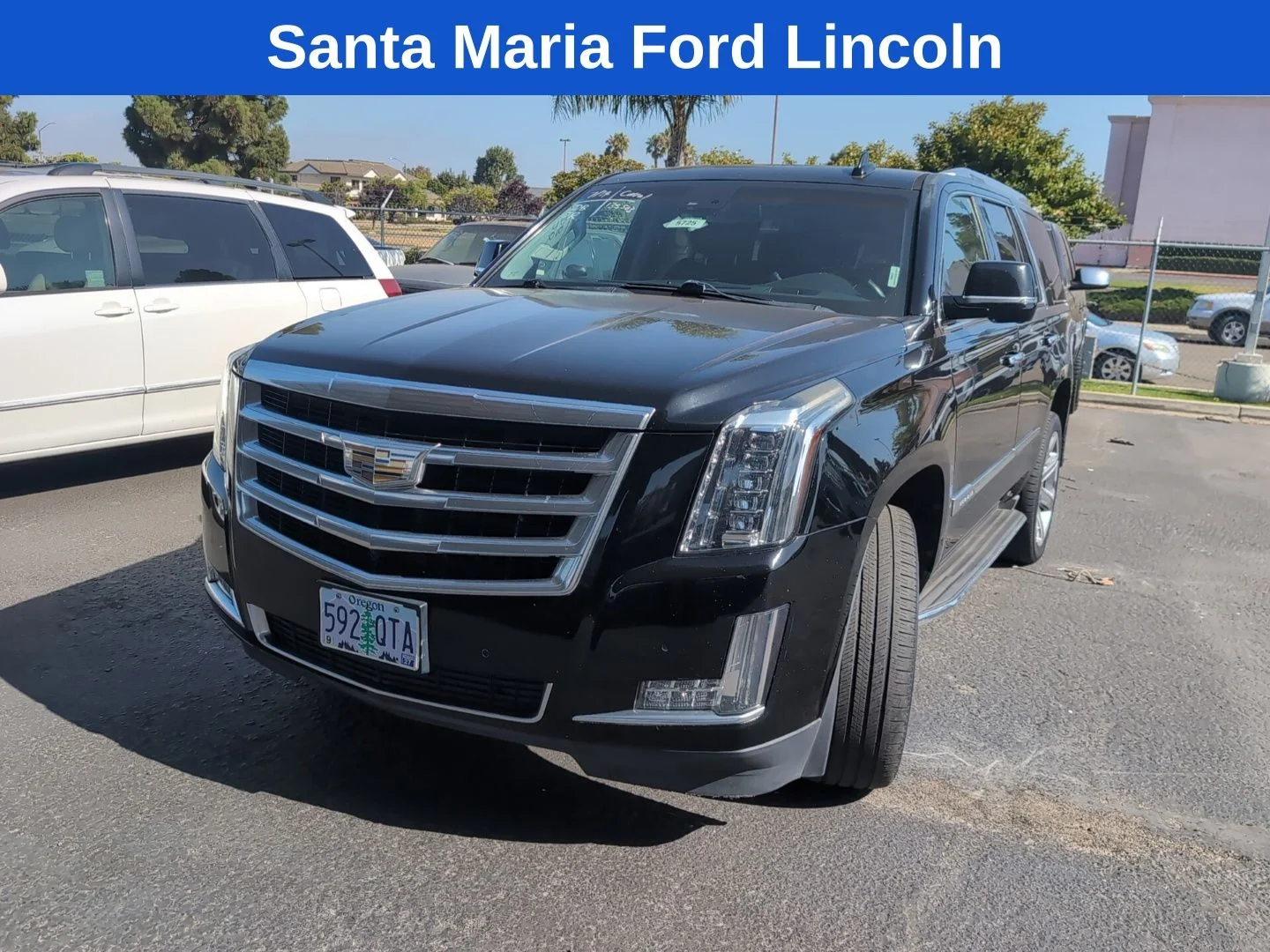 Used 2015 Black Raven Cadillac Luxury image 1
