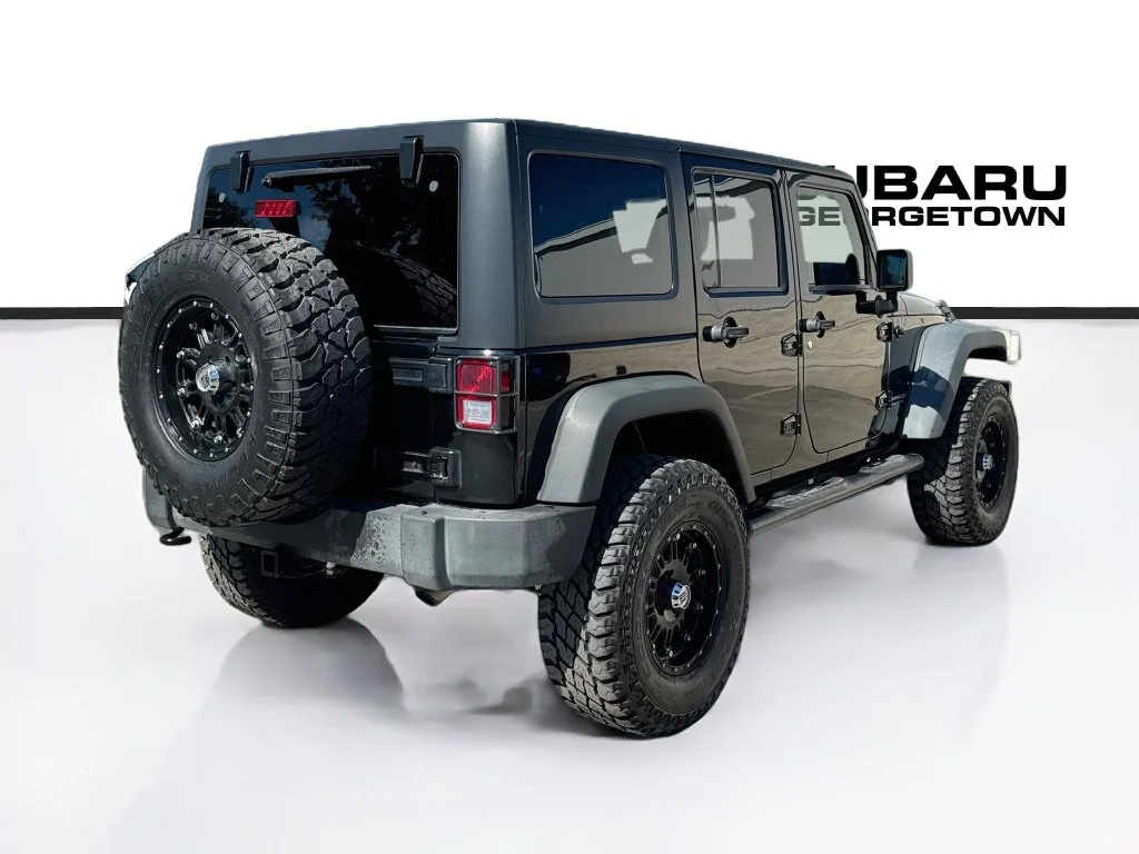 Used 2014 Black Jeep Unlimited Rubicon image 7