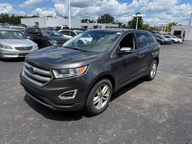 Used 2016 Gray Ford SEL image 1
