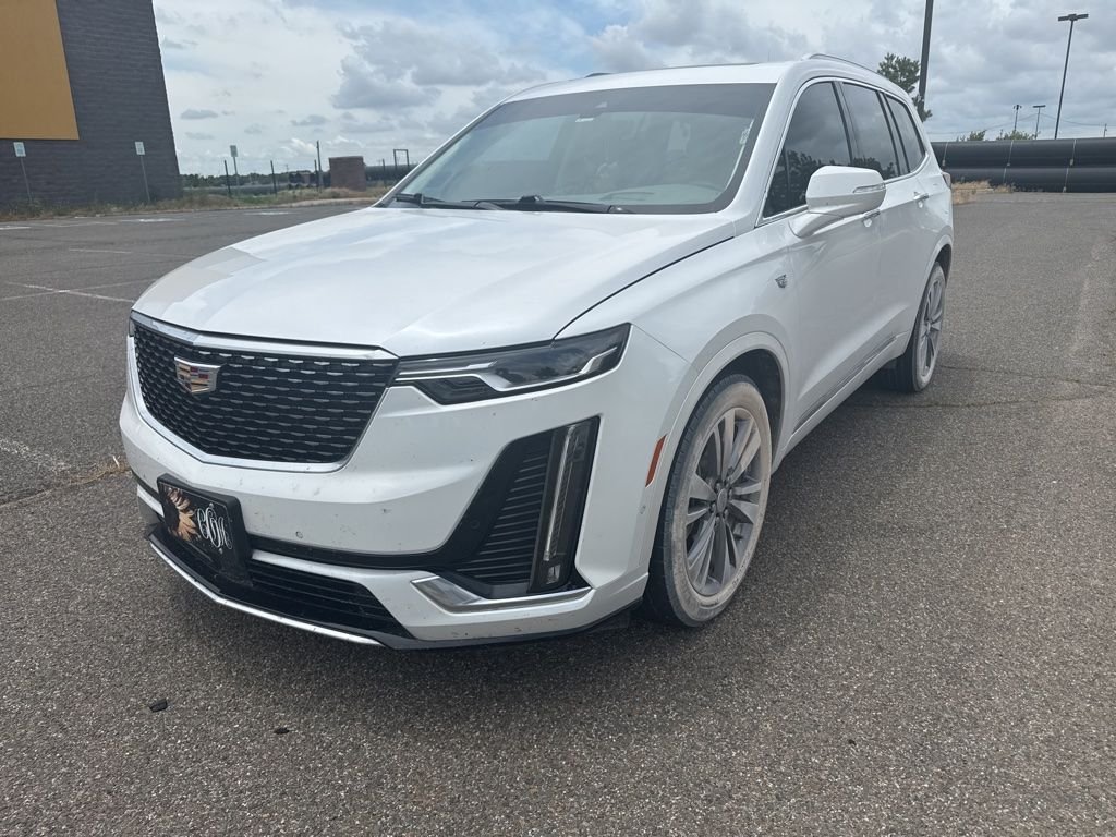 Used 2022 White Cadillac Premium Luxury image 1