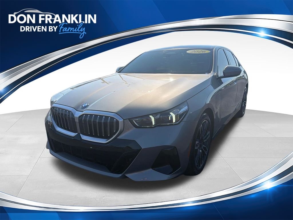 Used 2026 Gray BMW 550e xDrive image 1