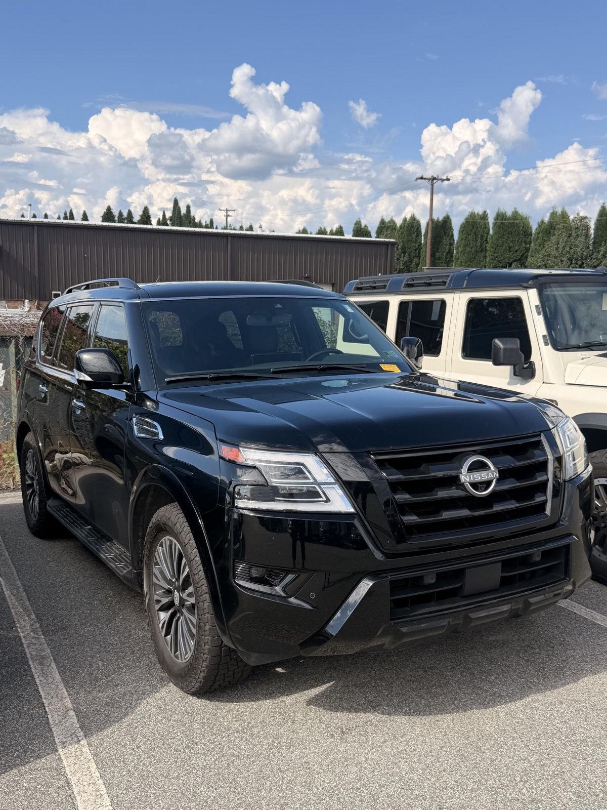 Used 2023 Super Black Nissan SL image 2