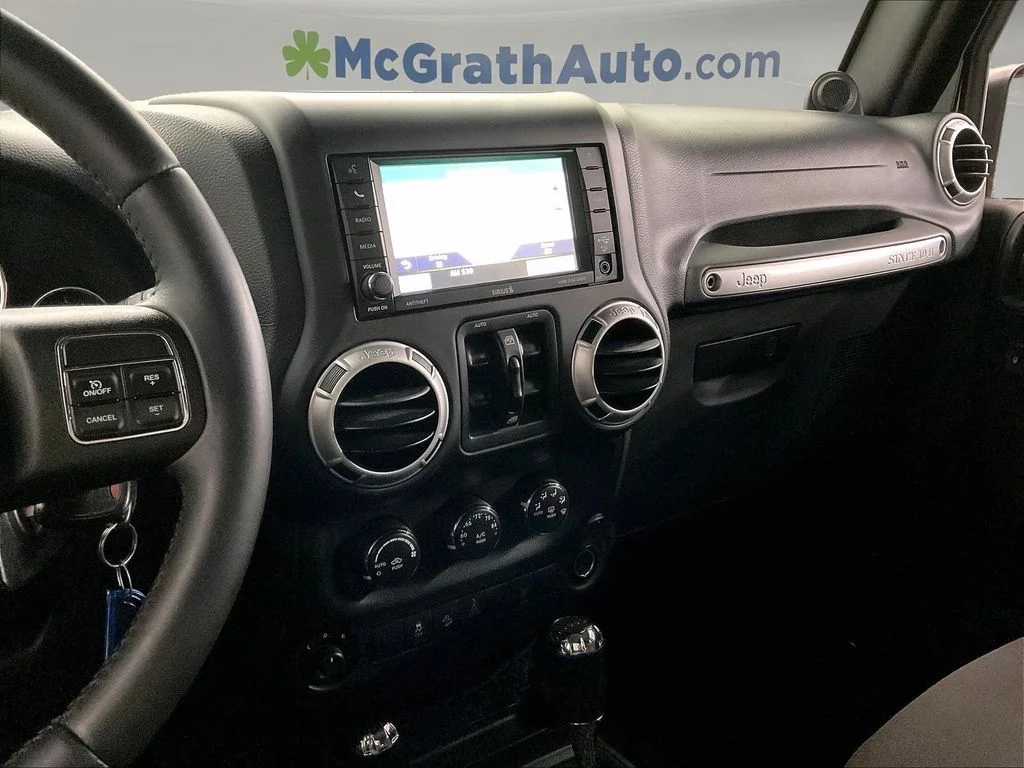 Used 2013 Black Jeep Unlimited Sahara image 9