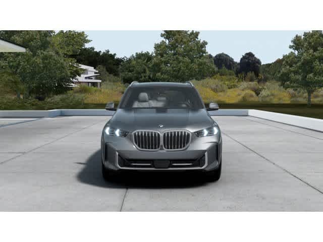 Used 2026 Skyscraper Grey Metallic BMW xDrive50e image 3