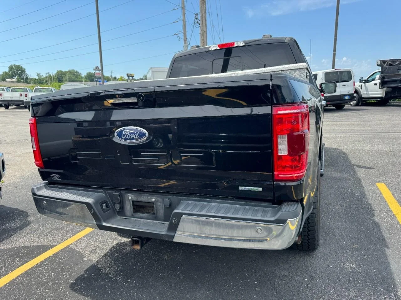 Used 2021 Agate Black Metallic Ford XLT 4WD SuperCrew 5.5' Box image 9