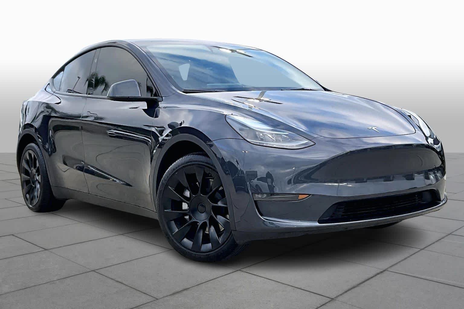 Used 2024 Tesla Model Y Long Range with VIN 7SAYGDEEXRA228550 for sale in Anaheim, CA