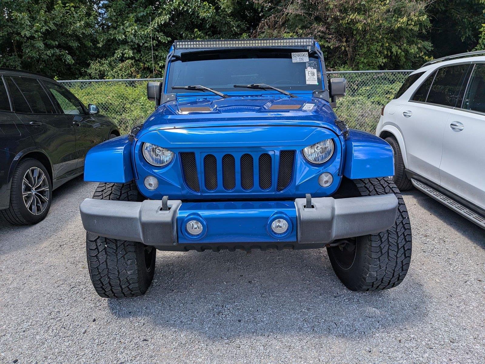 Used 2016 Hydro Blue Pearlcoat Jeep Sahara image 2