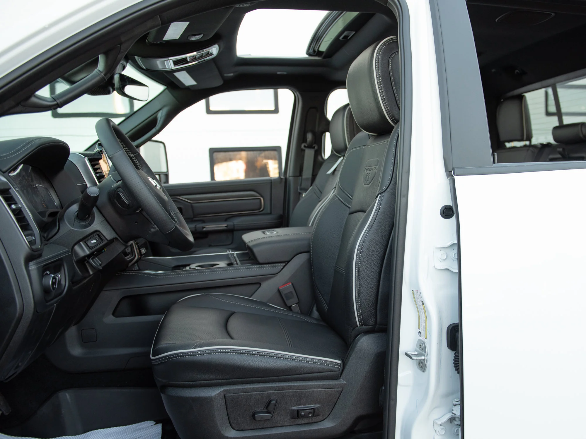 New 2026 White RAM Rebel* Crew Cab 4x4, 6.7L Cummins, Sunroof, 34 Inch A/T Tires image 24