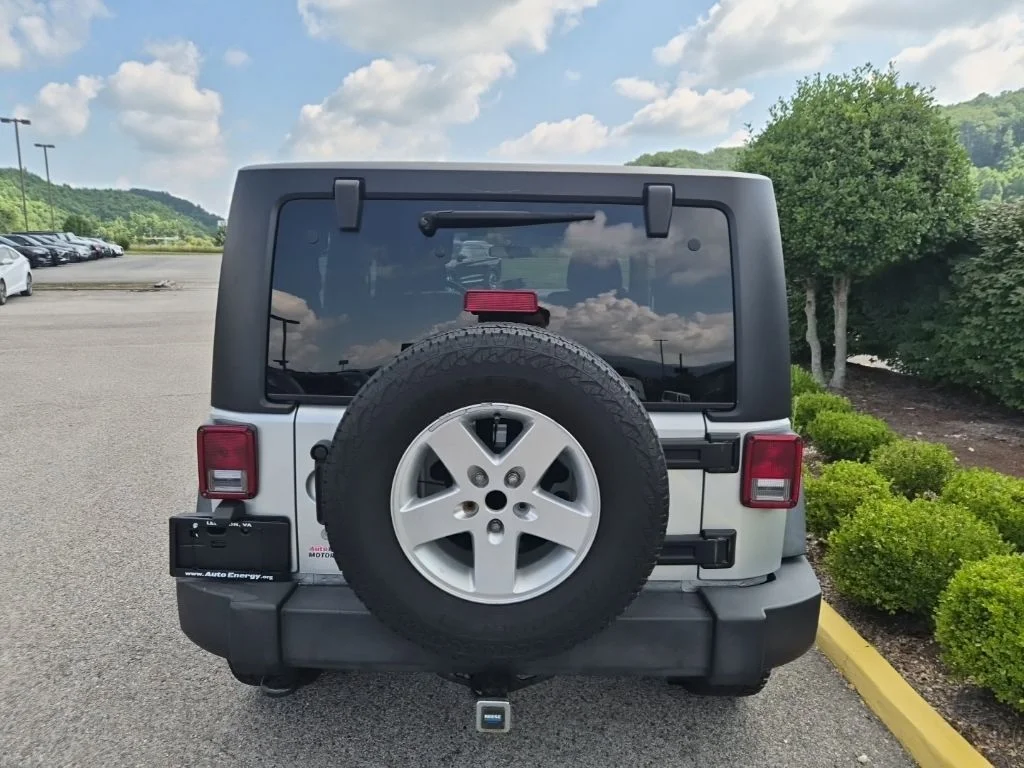 Used 2012 Bright Silver Metallic Jeep Sport image 7