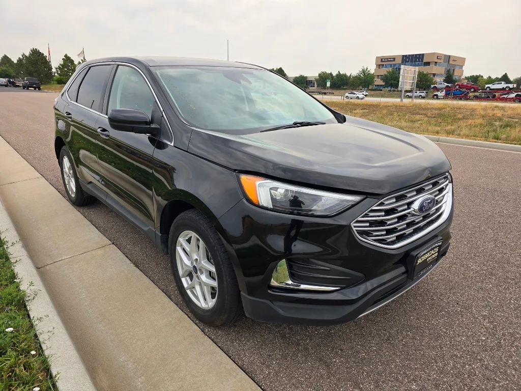 Used 2022 Agate Black Metallic Ford SEL image 7