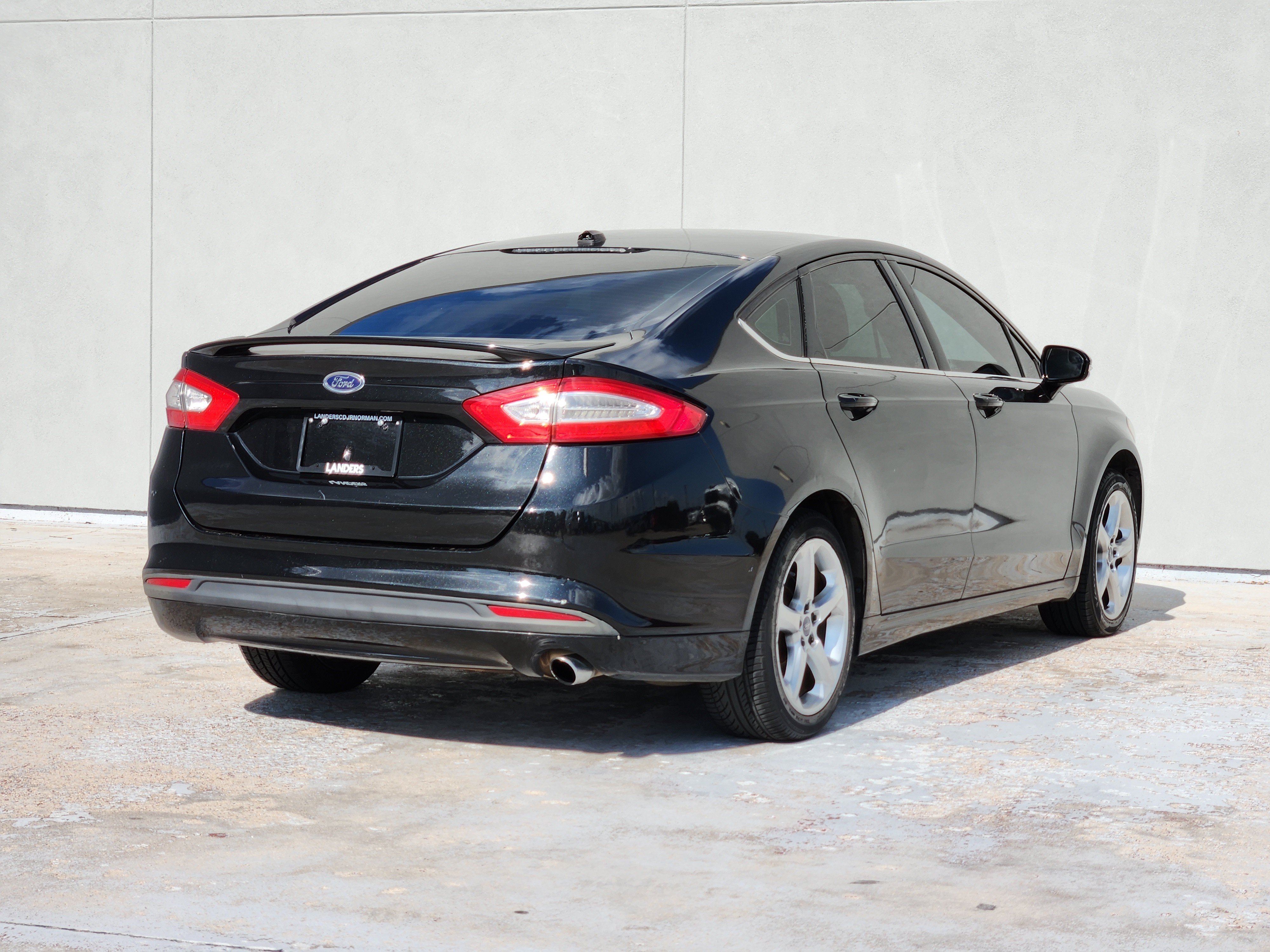 Used 2013 Tuxedo Black Metallic Ford SE image 7