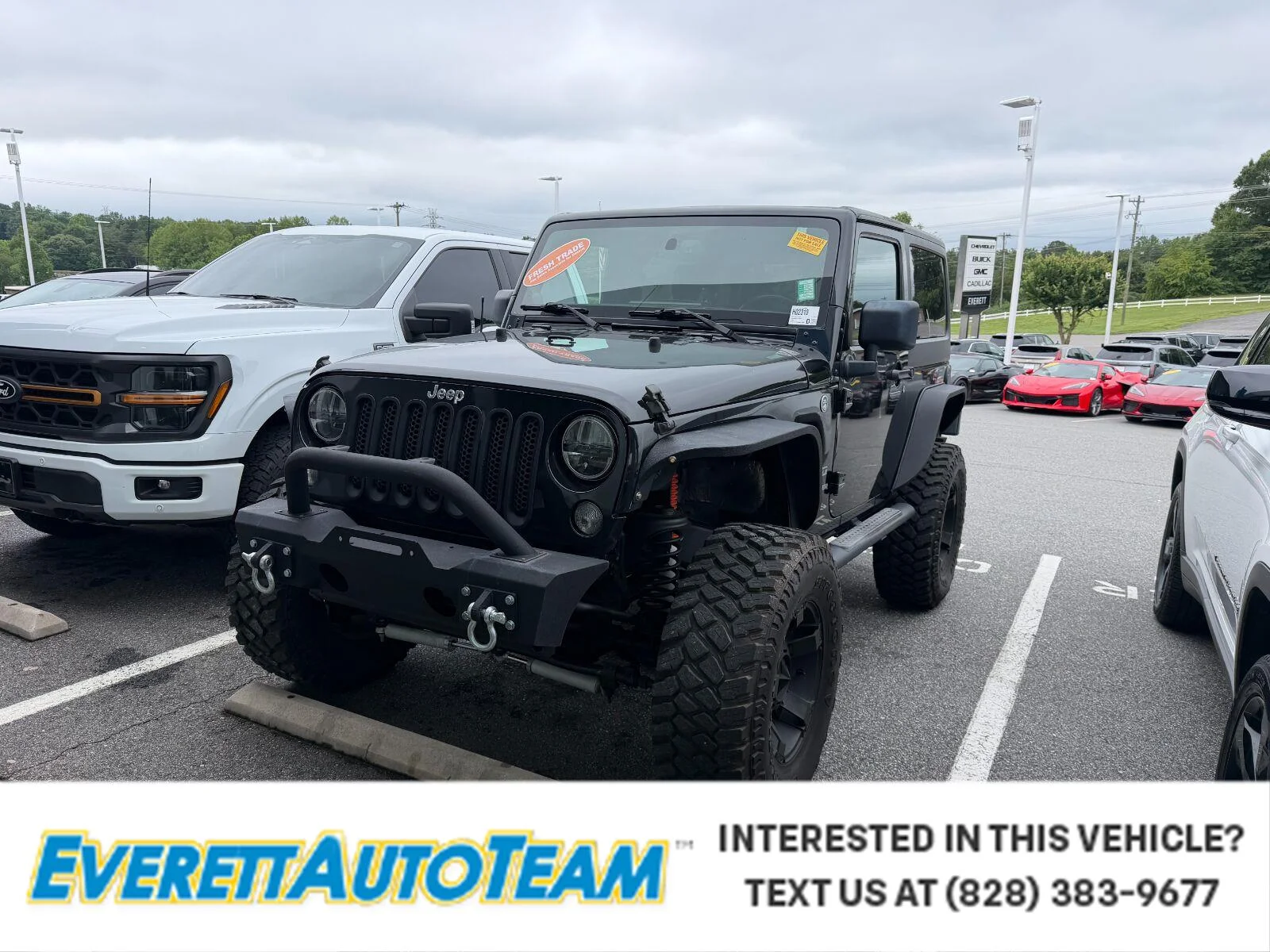 Used 2014 Black Clearcoat Jeep Sport image 1
