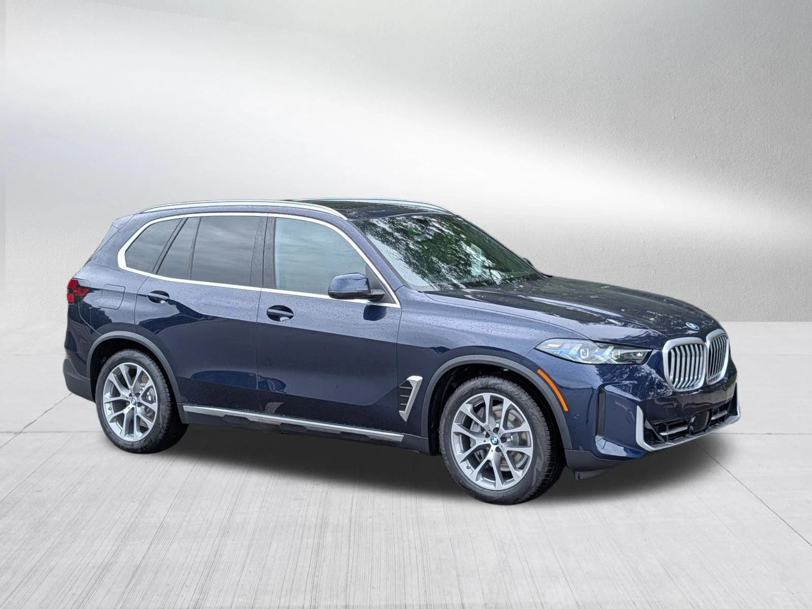 New 2026 Tanzanite Blue II Metallic BMW xDrive50e image 1