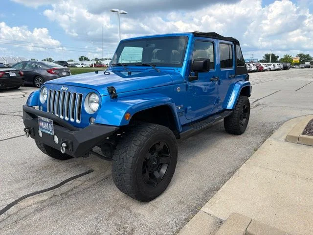 Used 2016 Blue Jeep Unlimited Sahara image 10