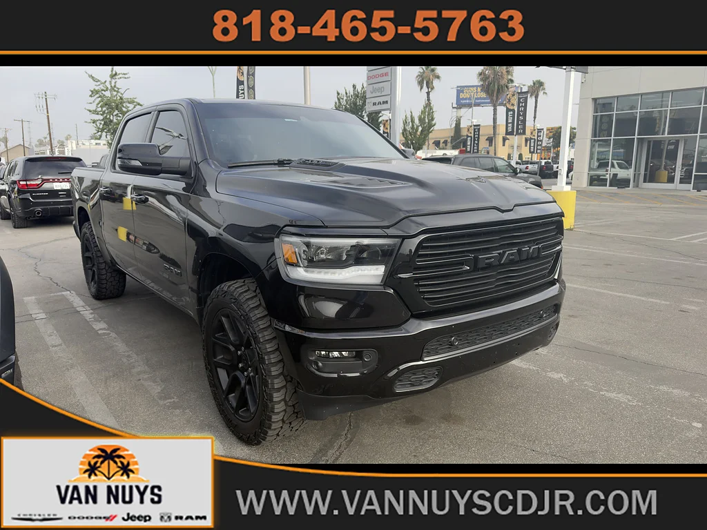 Used 2024 Diamond Black Crystal Pearl Coat Ram Laramie image 1