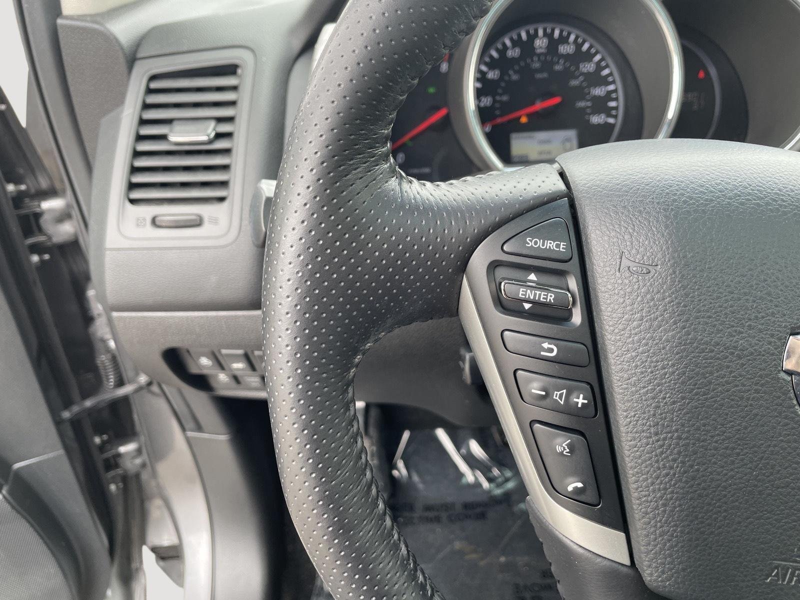 Used 2013 Gun Metallic Nissan LE image 18