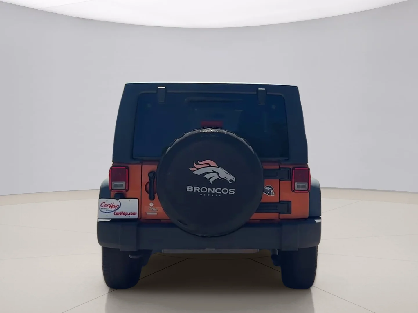 Used 2011 Orange Jeep UNLIMITED image 4